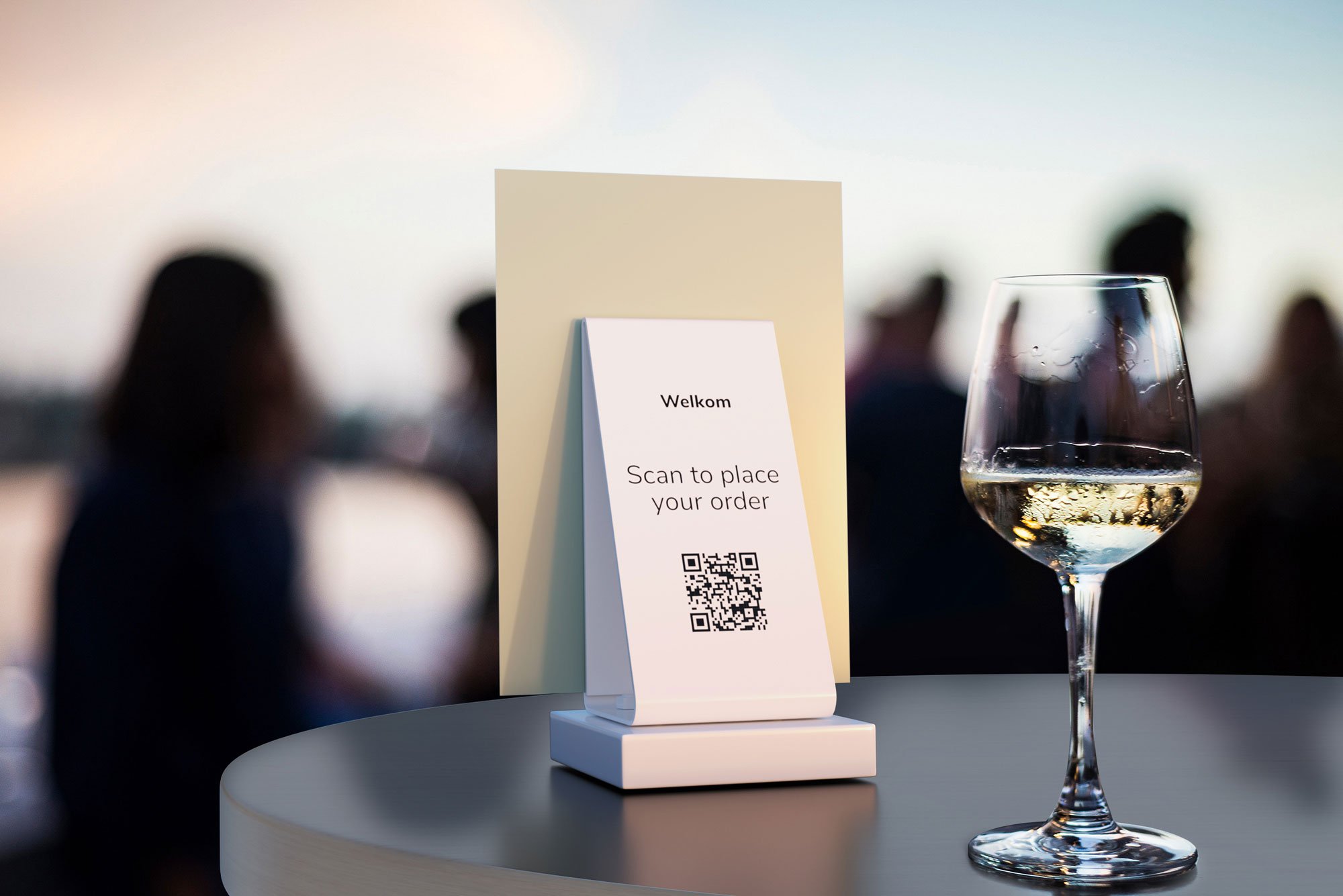 scannable barcode and glass of wine on a table