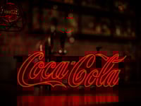 Coca Cola Illuminated LED neon sign on bat counter