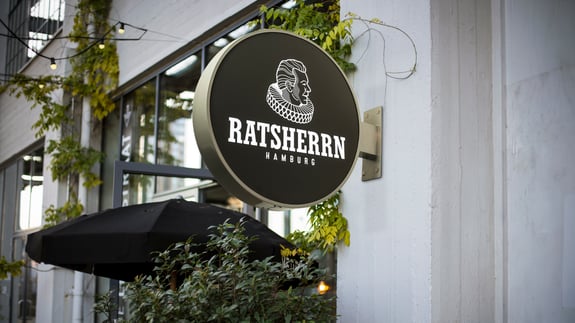Ratsherrn Outdoor Sign + Matching building facade V2-1920x1080 ratio - Low resolution