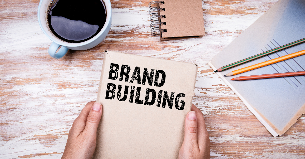 Book with brand building printed on cover on a table